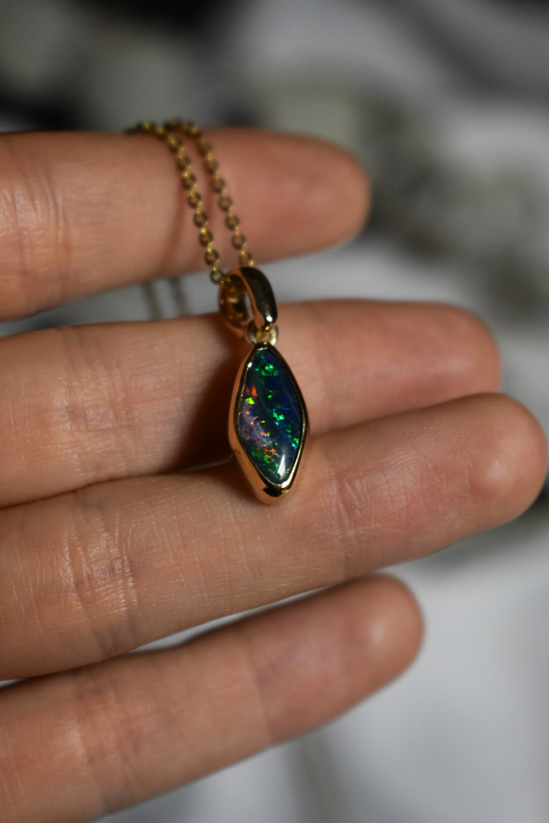 18k solid gold black opal pendant