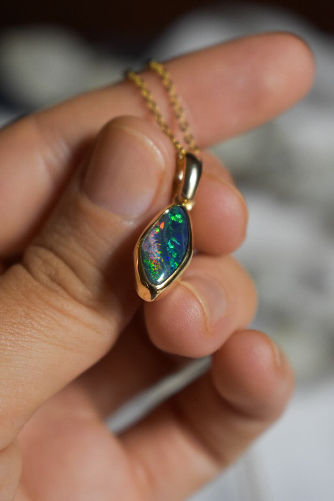 18k solid gold black opal pendant