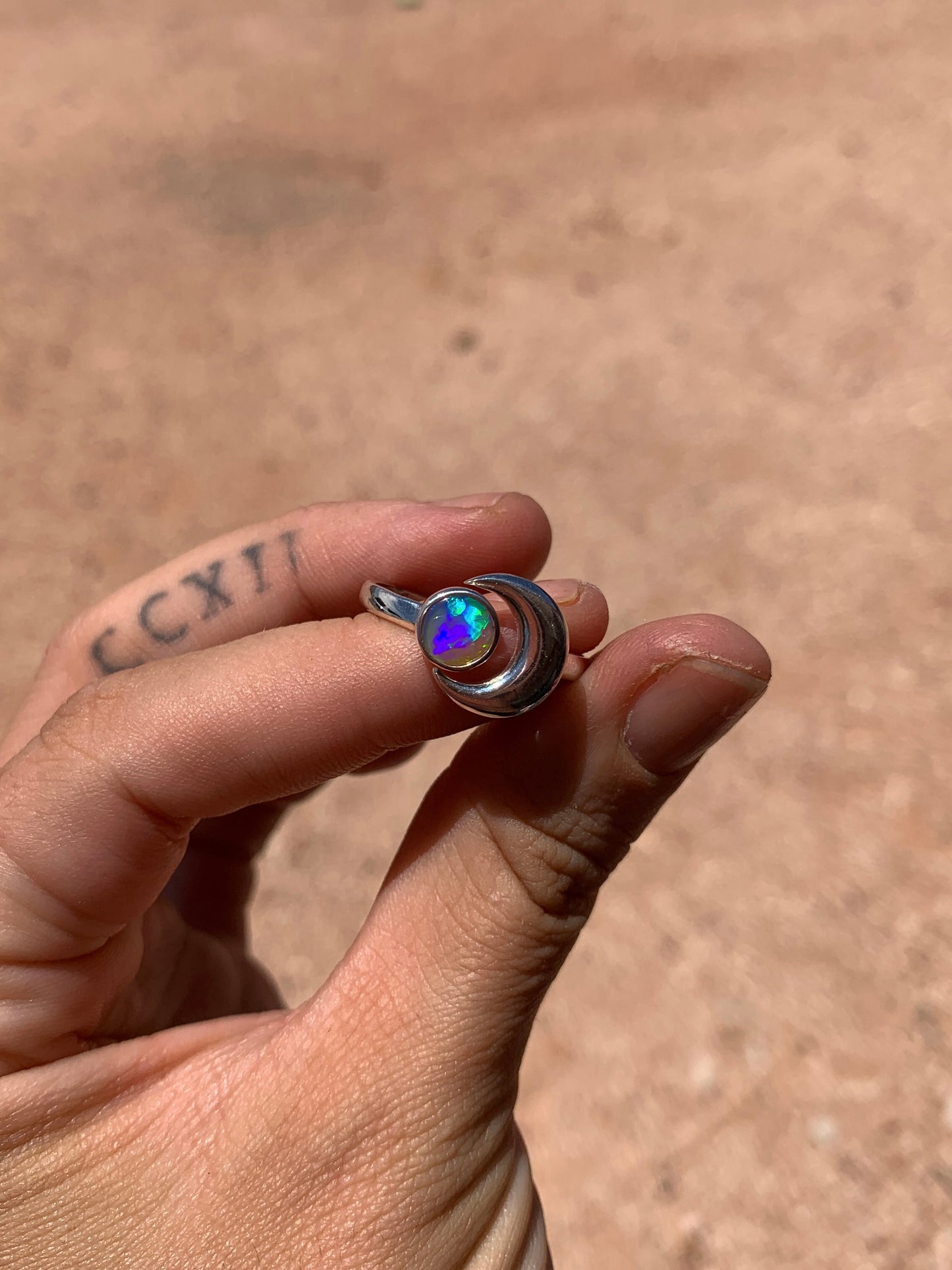 Crescent Moon Crystal Opal - size 9 (pulls out to a size 10)